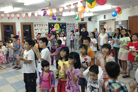 Children worship and learning at HCBC
